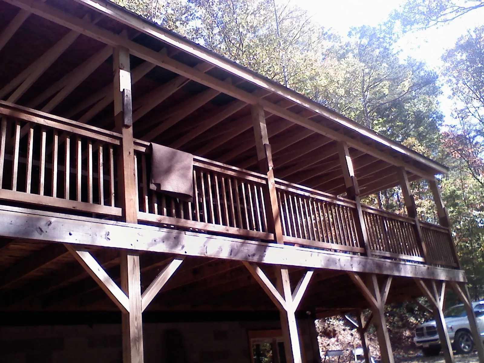 Timber framing under a new elevated porch and deck — Roof Leak Repair in Mount Blanchard by Roofing Brothers